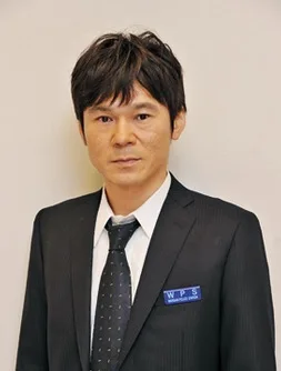 Portrait photograph of Masahiro Komoto