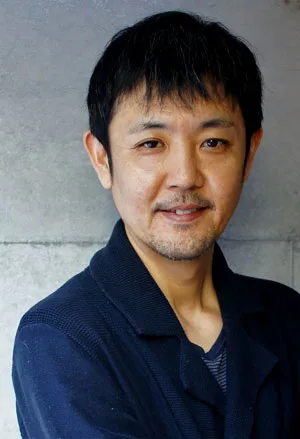 Takashi Okabe profile portrait