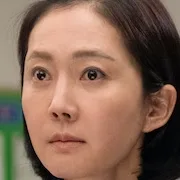 Yum Jung-Ah as Taek-Il's mother