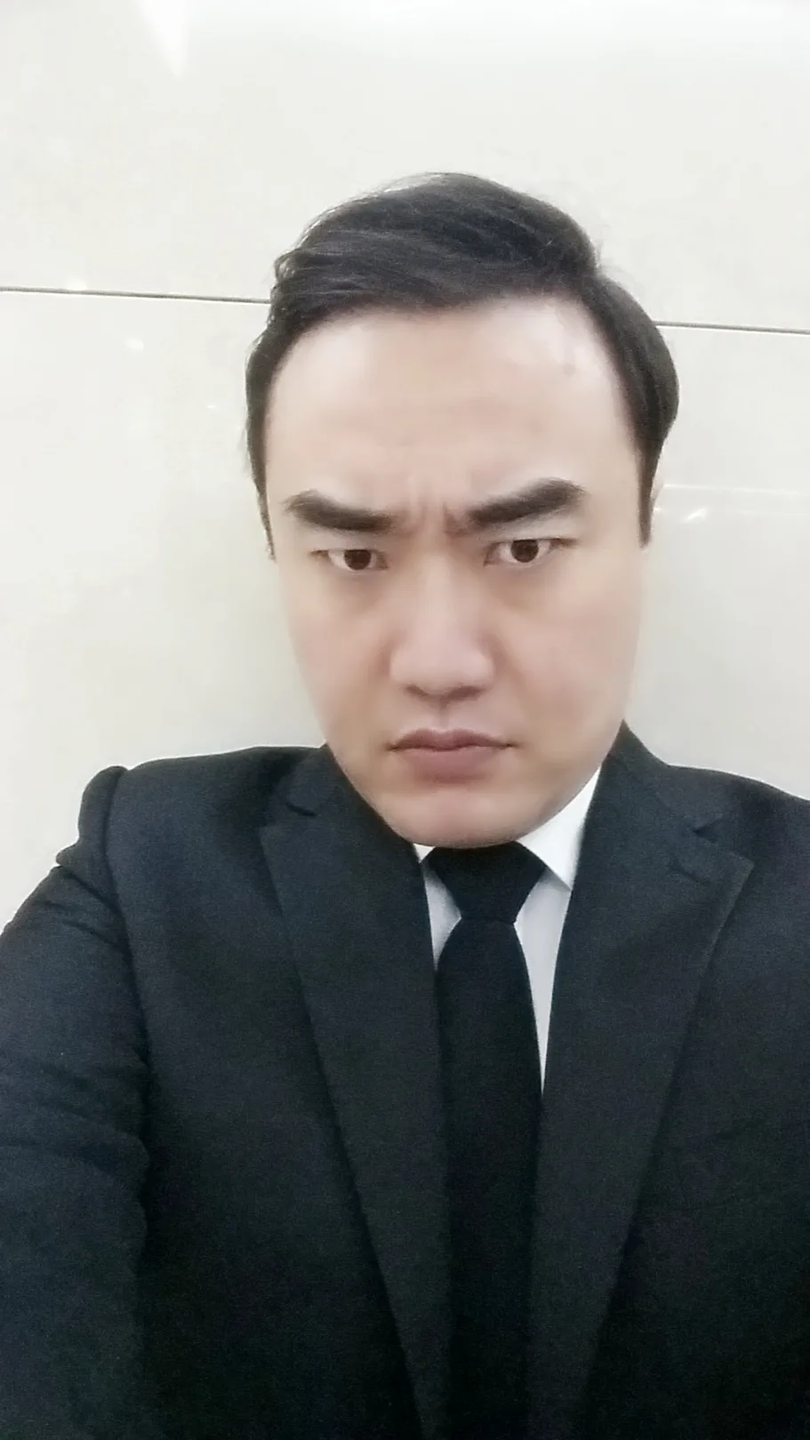 Portrait photograph of South Korean actor Kim Sung-Kang