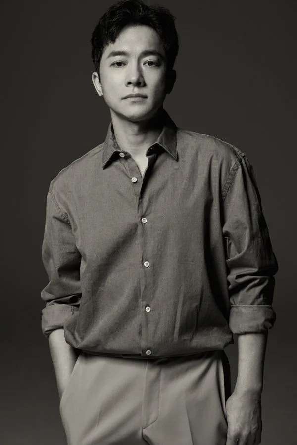 Portrait photograph of actor Kim Young-min