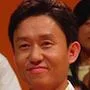 Son Bum-Soo as Quiz Show MC