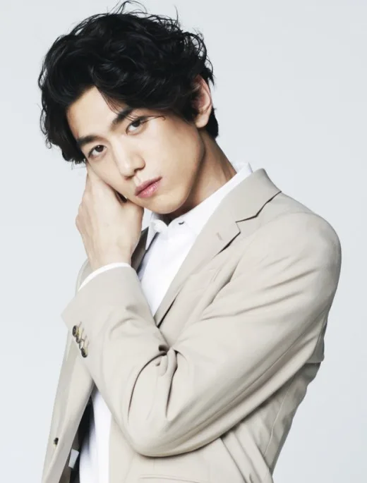 Sung Joon posing for a portrait photograph