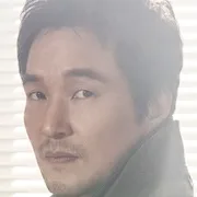 Han Suk-Kyu portraying Kim Sabu